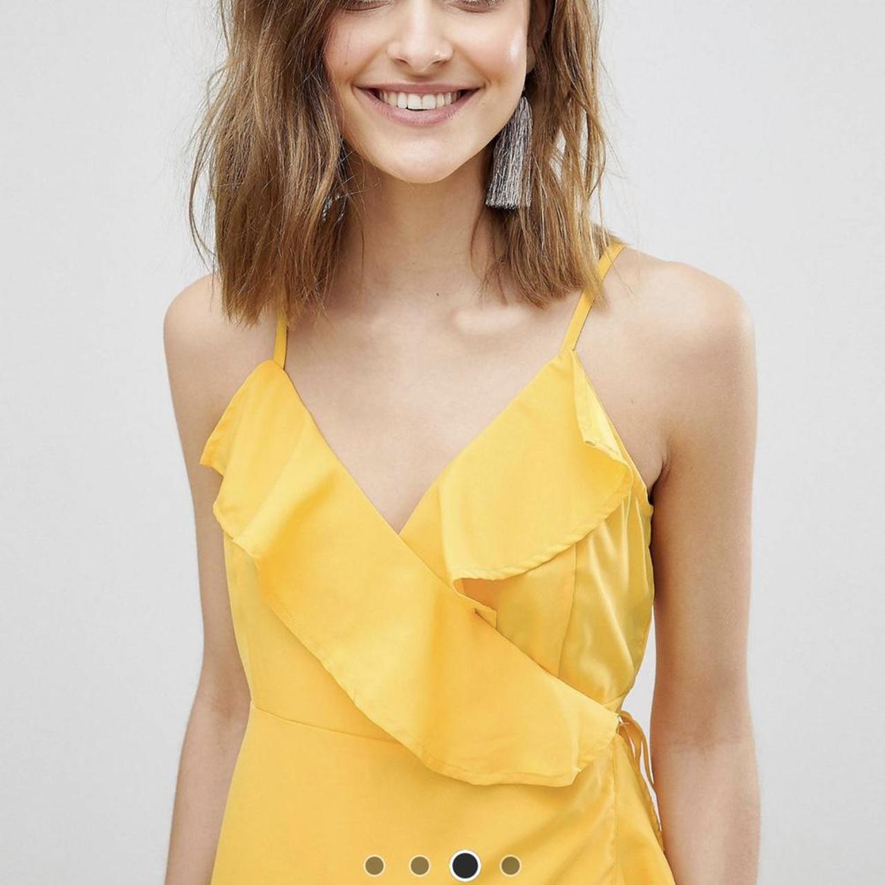 Vero moda wrap ruffle mini dress in yellow! Bought... Depop