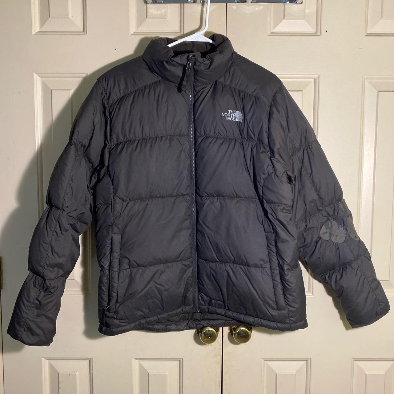 black and brown north face jacket