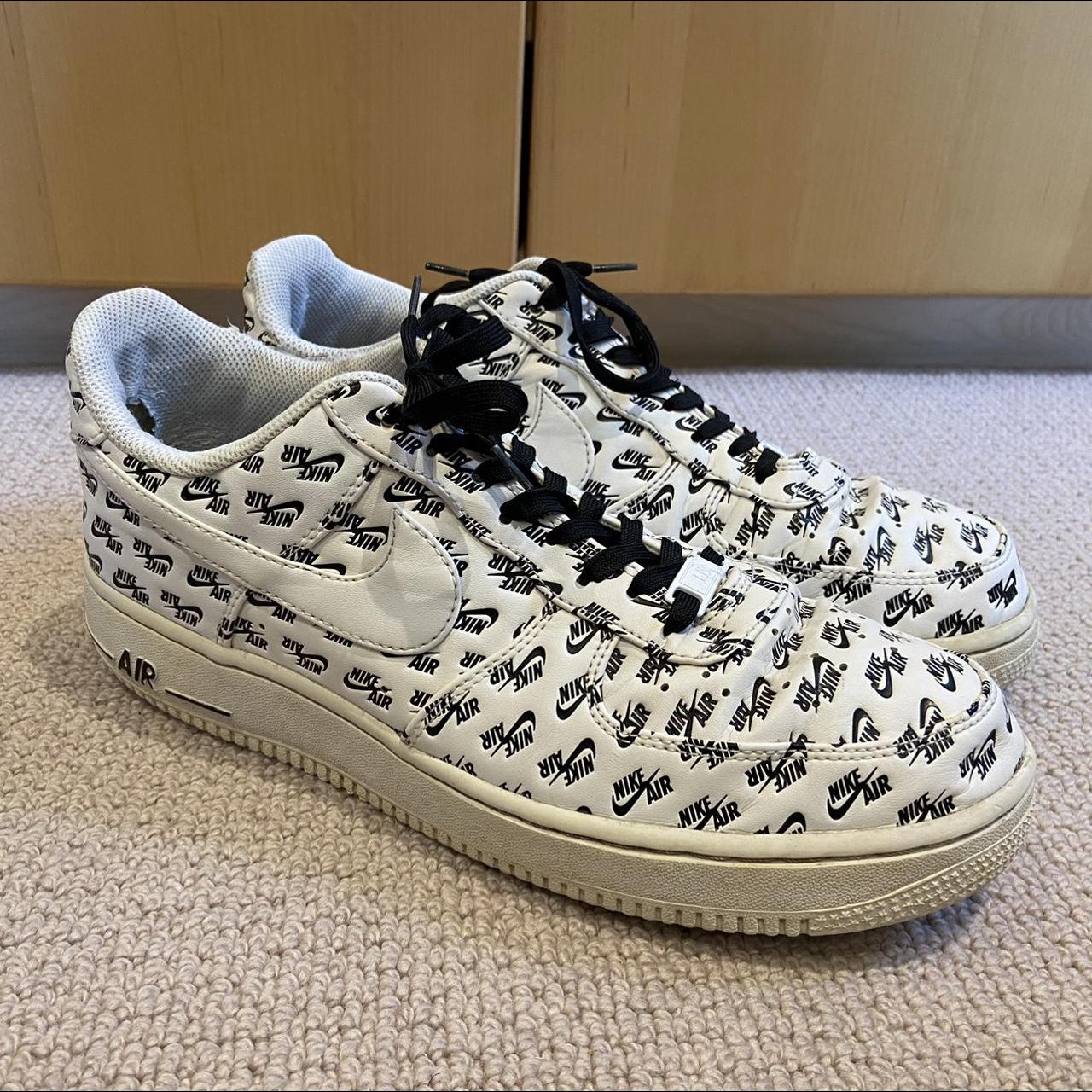 mens white nike shoes with black swoosh