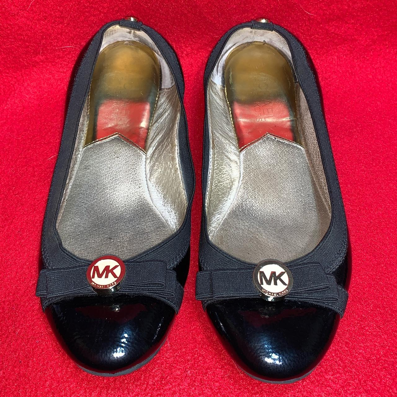 Black flat michael on sale kors shoes