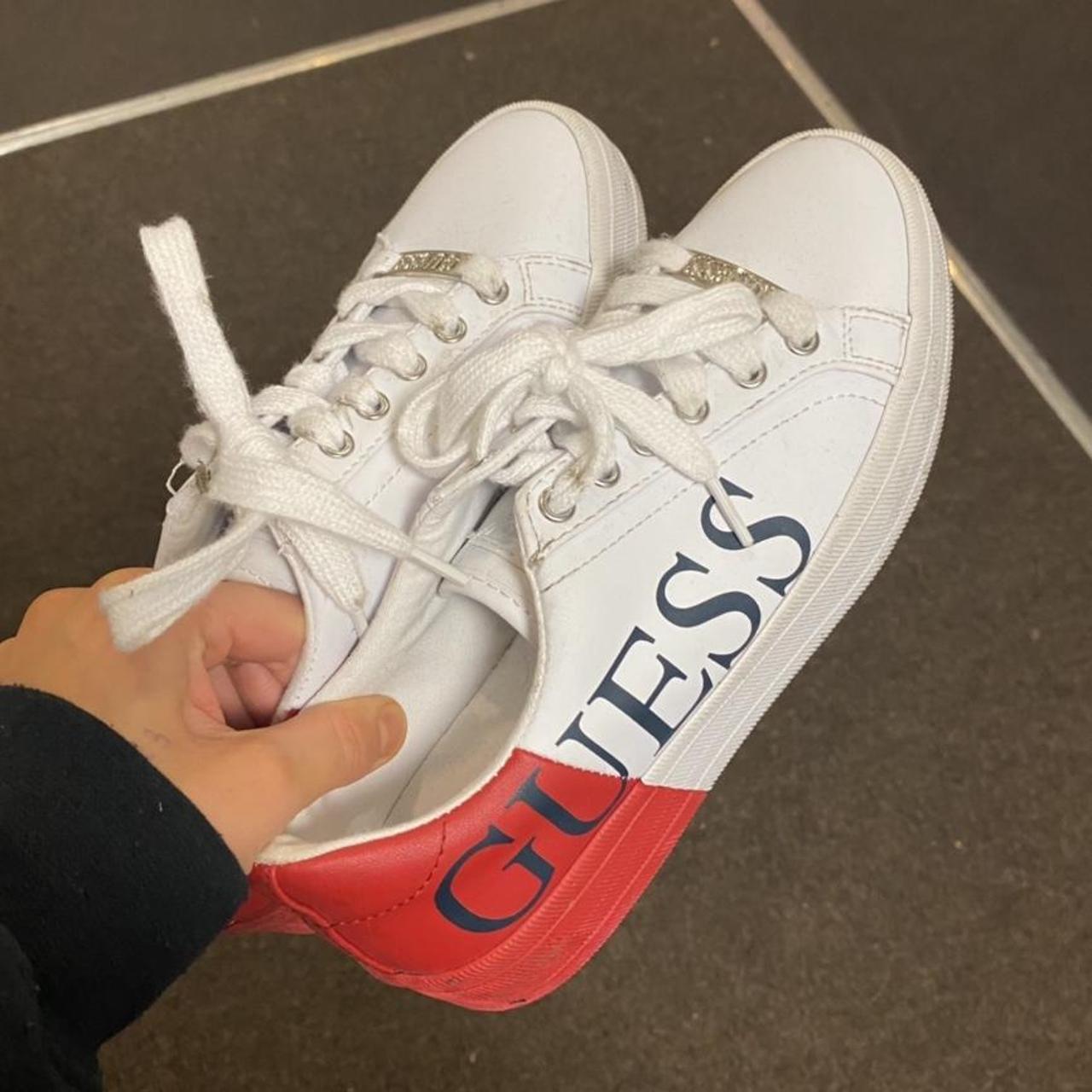 red guess trainers