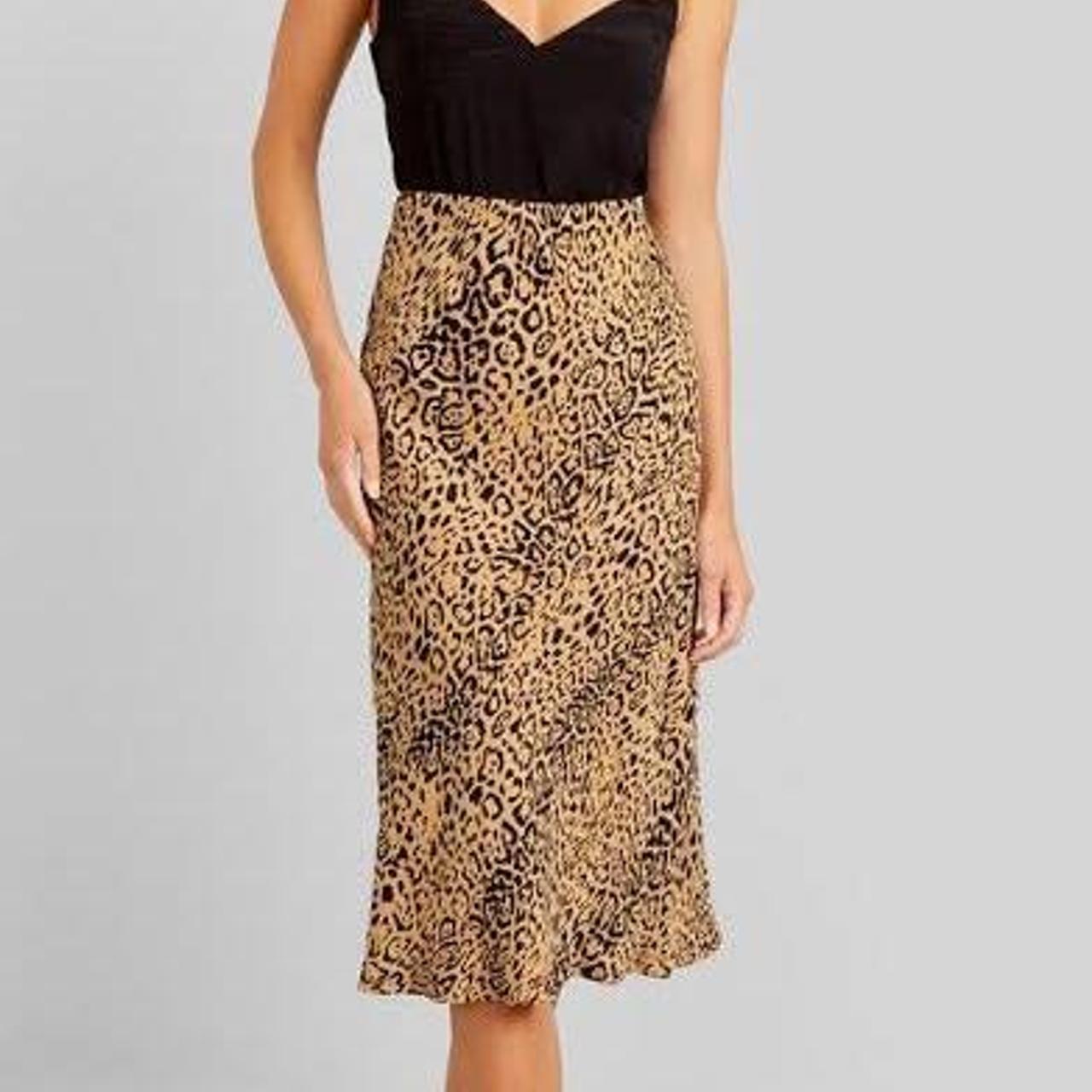 Kookai jaguar print midi skirt with elastic... - Depop