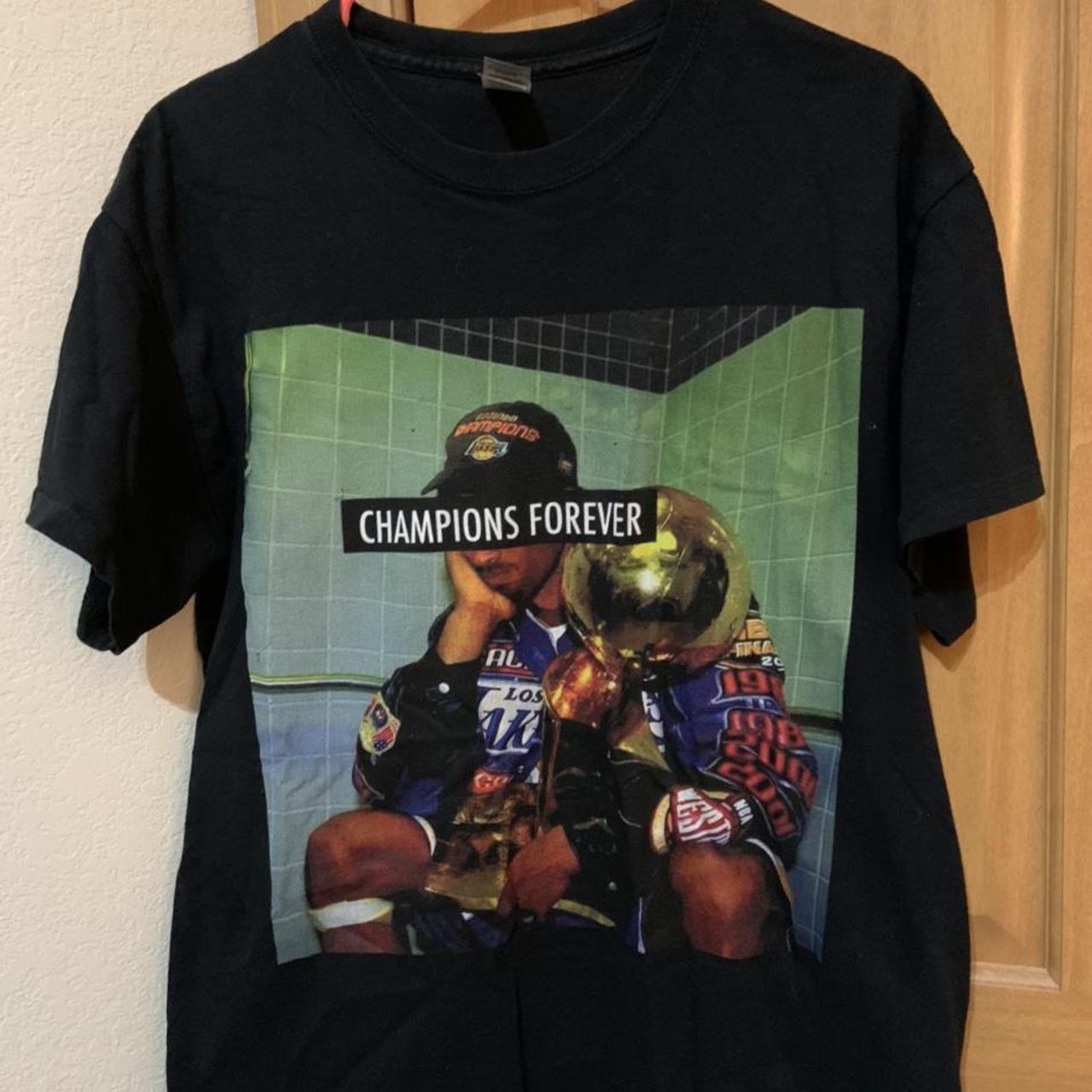 Kobe holding clearance trophy shirt