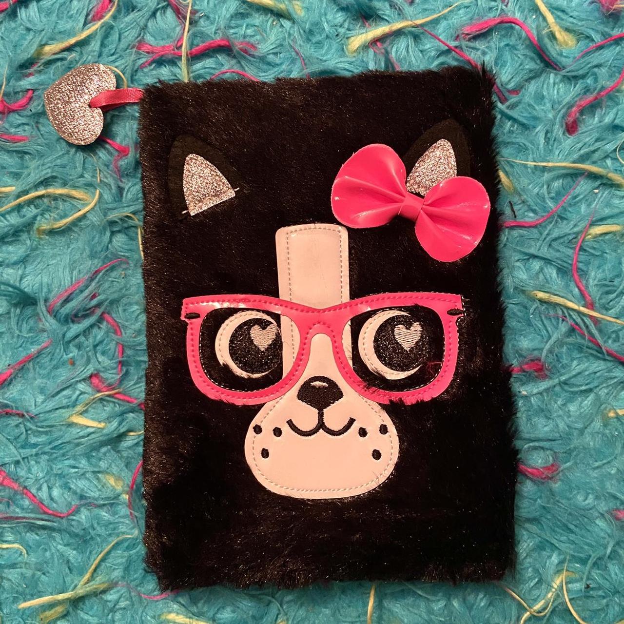 Super cute fuzzy notebook, has a built in bookmark.... Depop