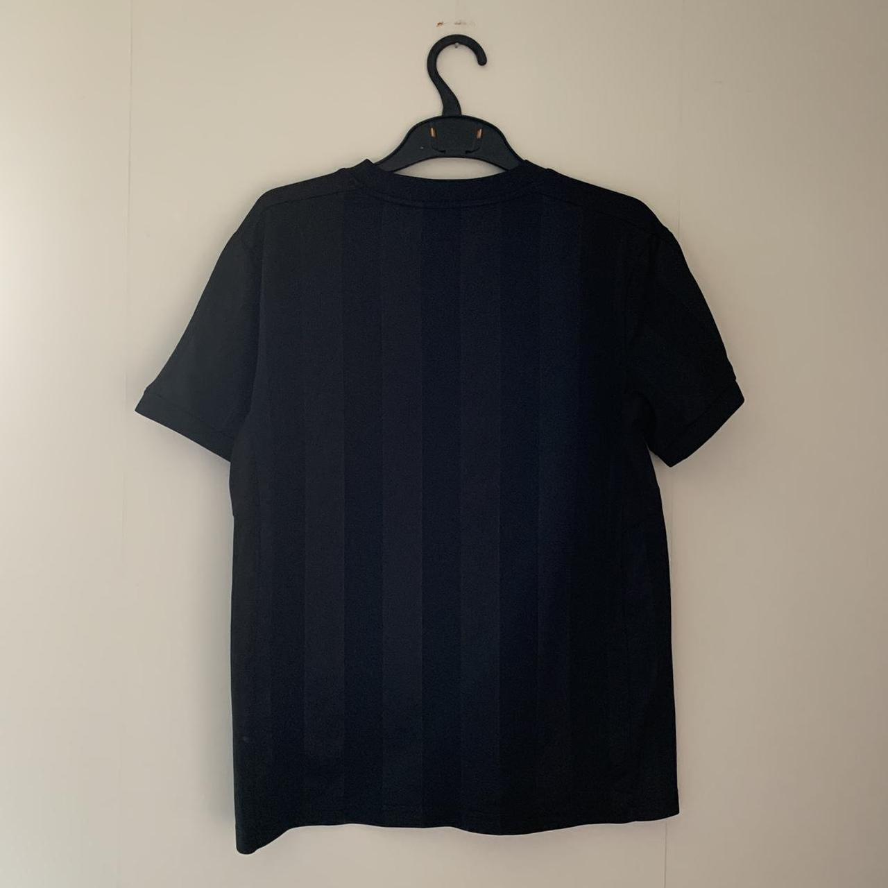 Puma Black and Gold T-shirt | Depop