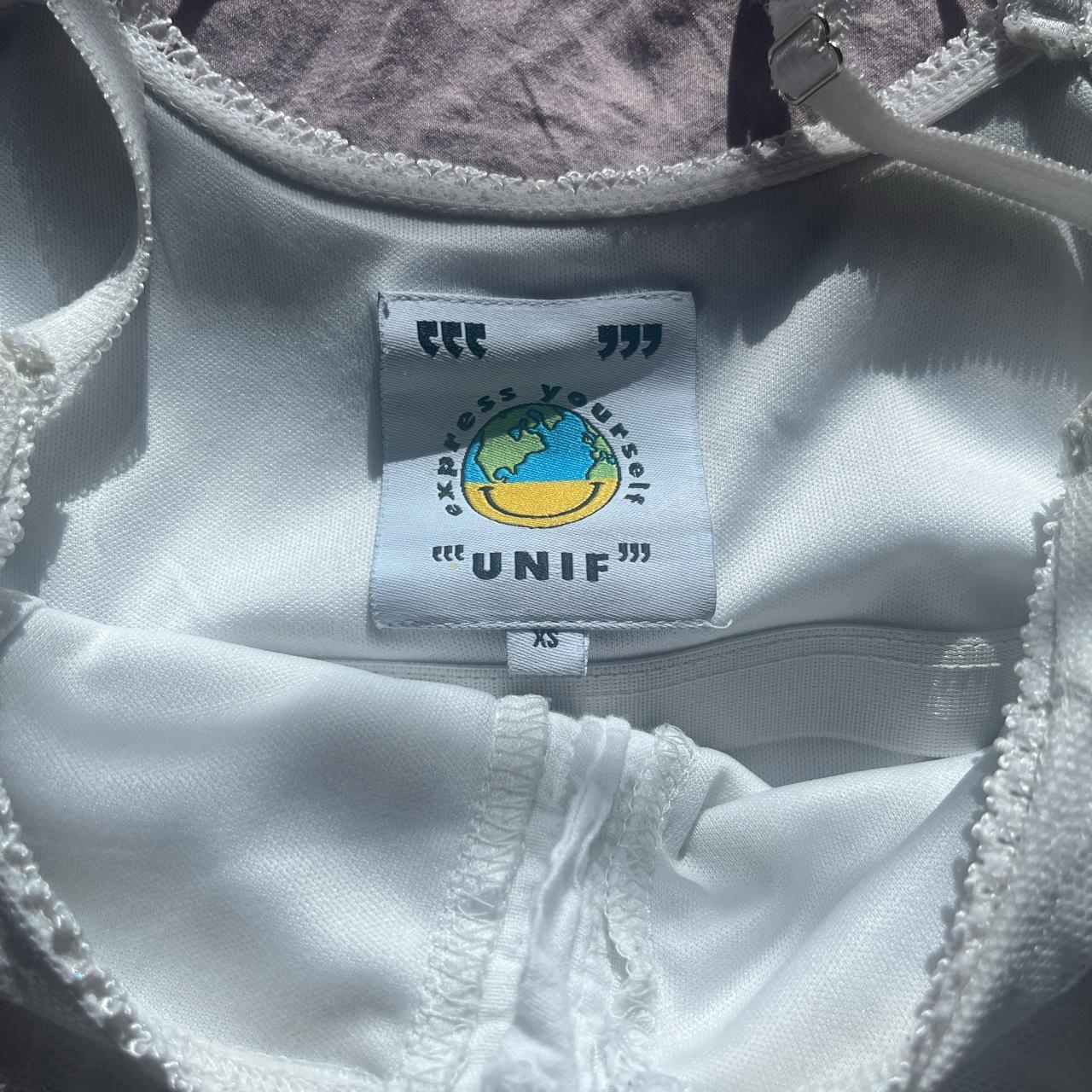 sold don’t buy!! white unif dew cami size xs •great... - Depop