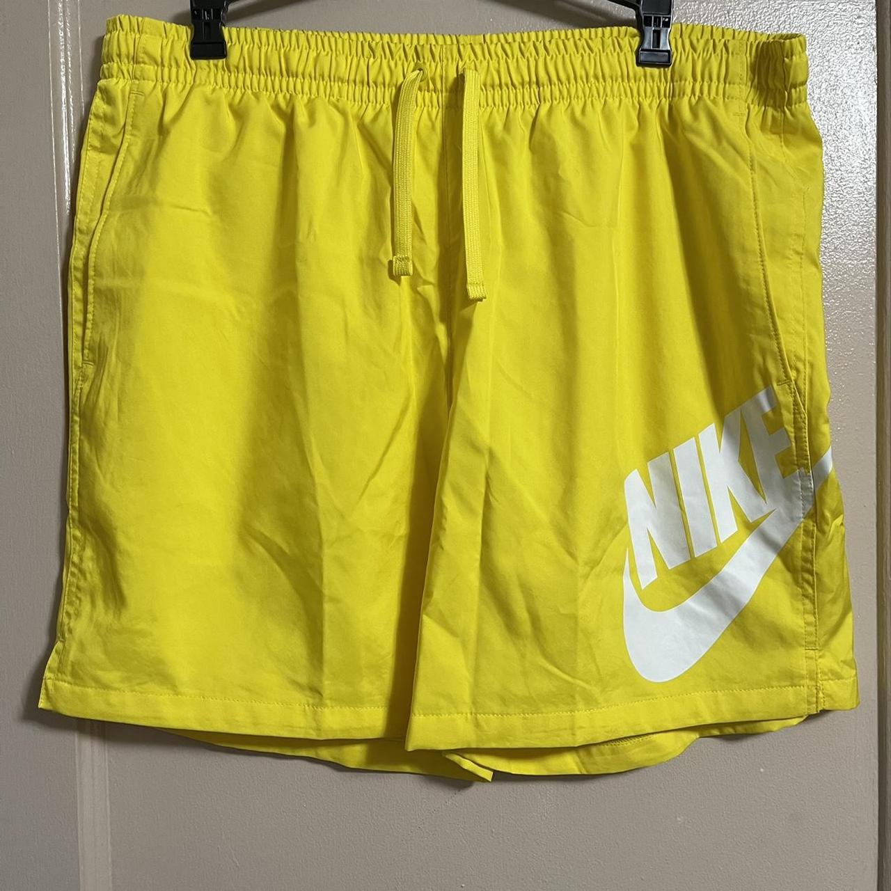 nike yellow woven shorts