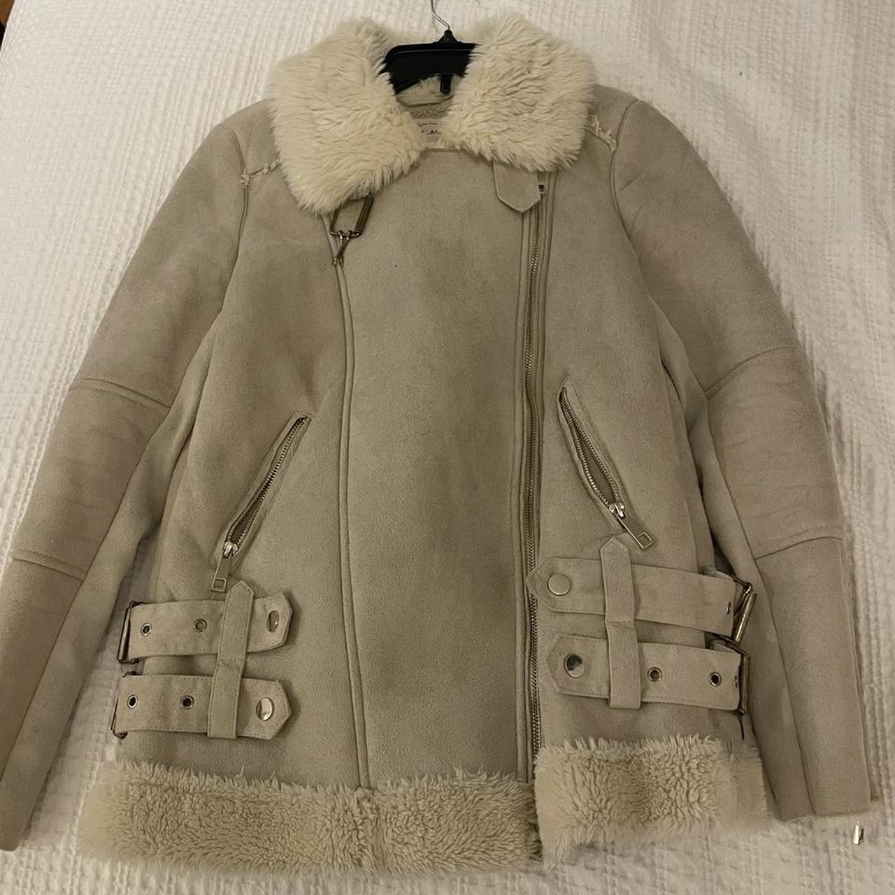 Very warm coat, covers whole upper body with straps... - Depop
