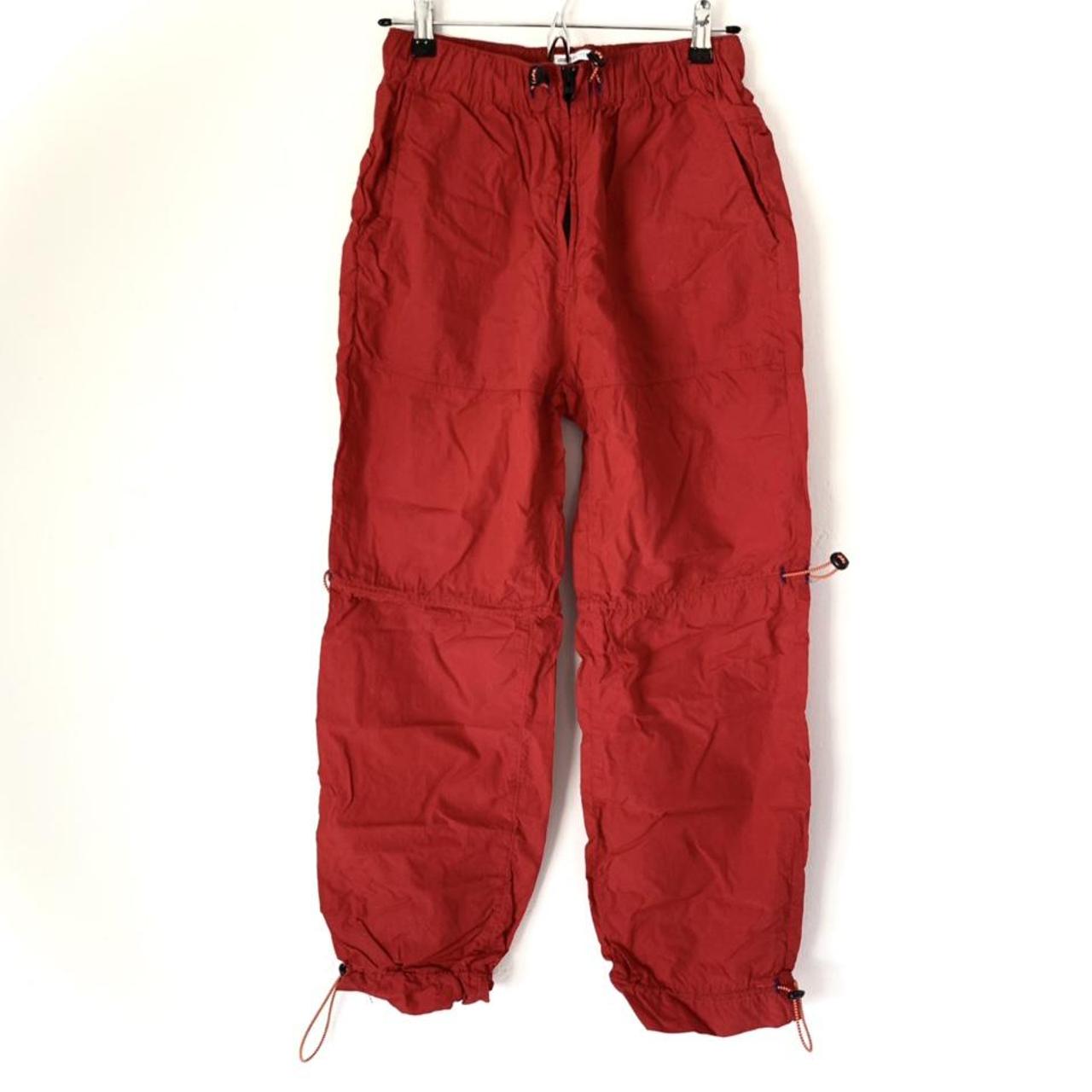 Urban Outfitters Red Joggers made out of wind... Depop