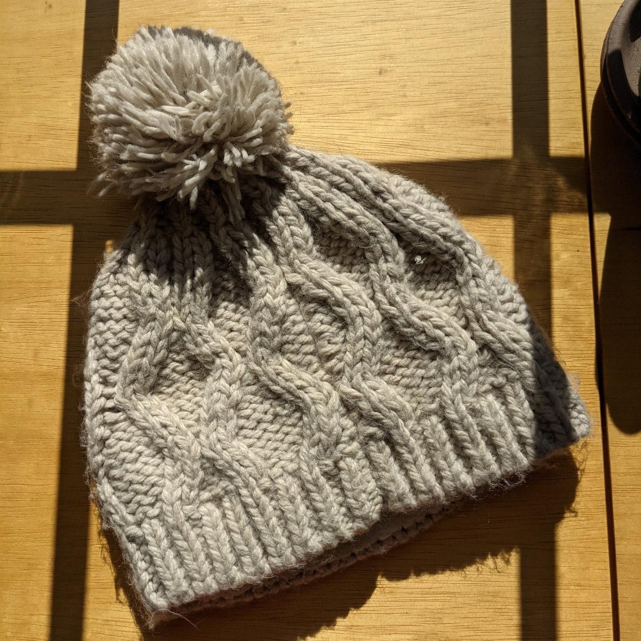 Beige/cream knit beanie with pom pom and fleece... Depop