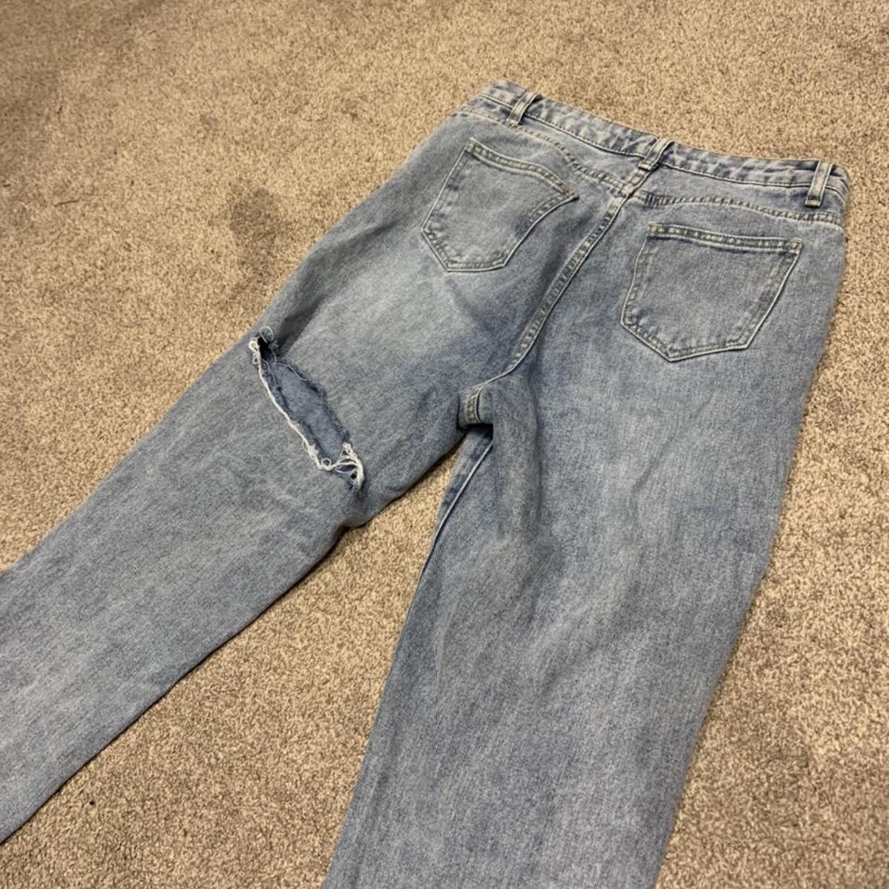 Jeans with sales cut under bum