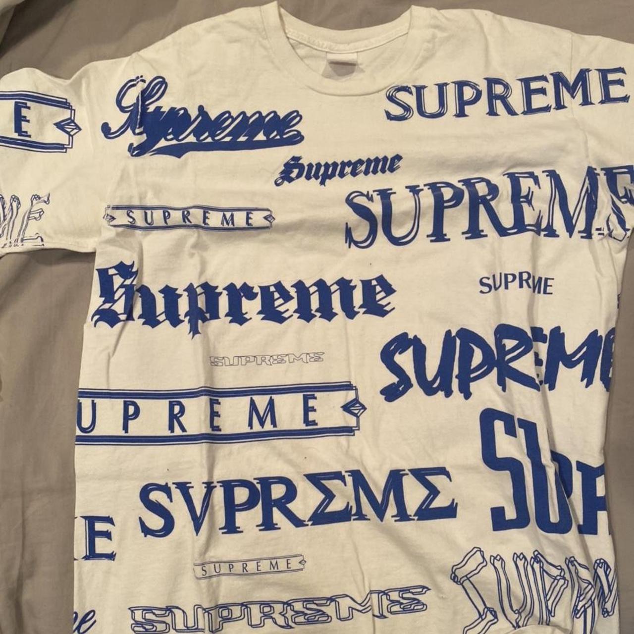 White and blue store supreme shirt