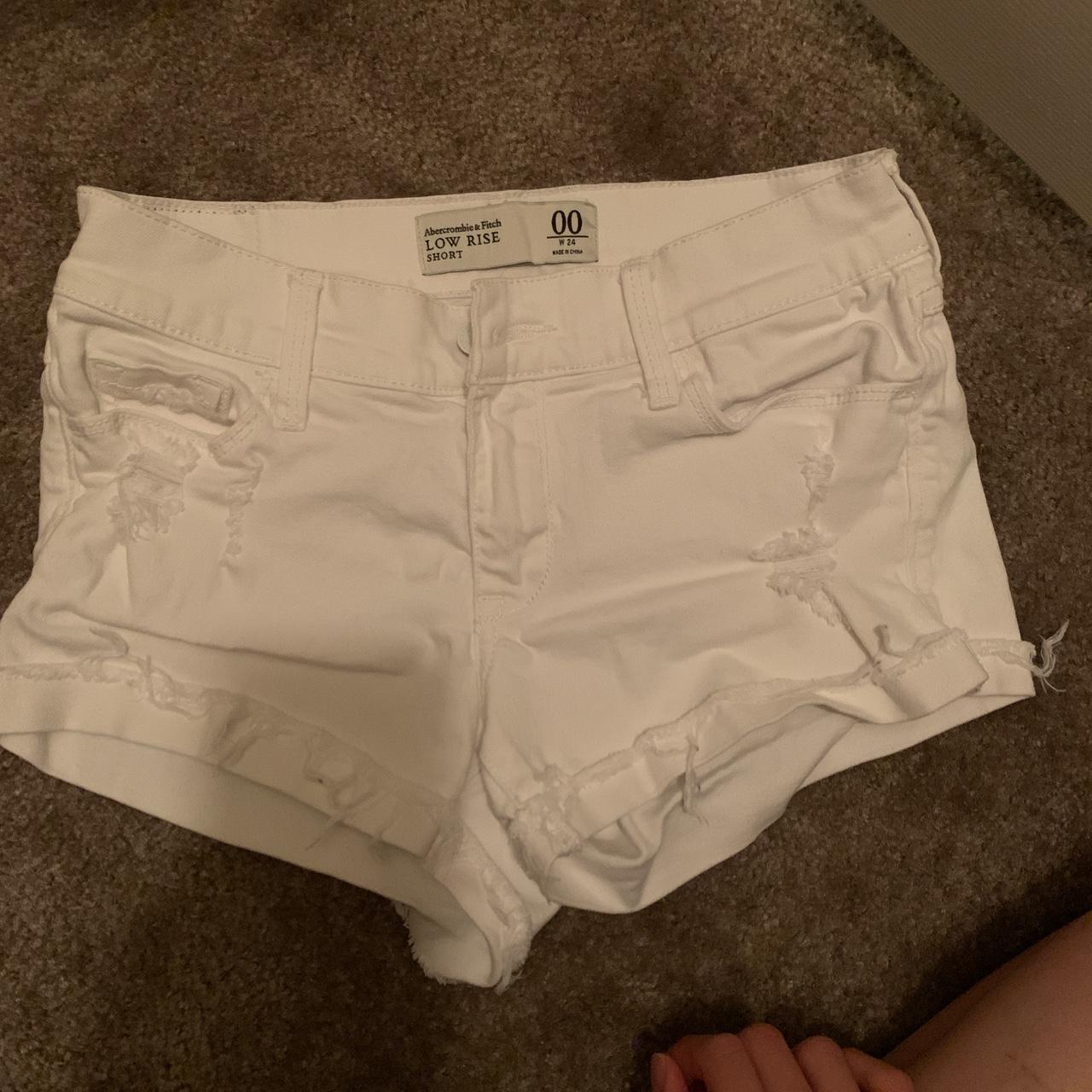 Abercrombie low rise denim shorts in white Size 00... - Depop