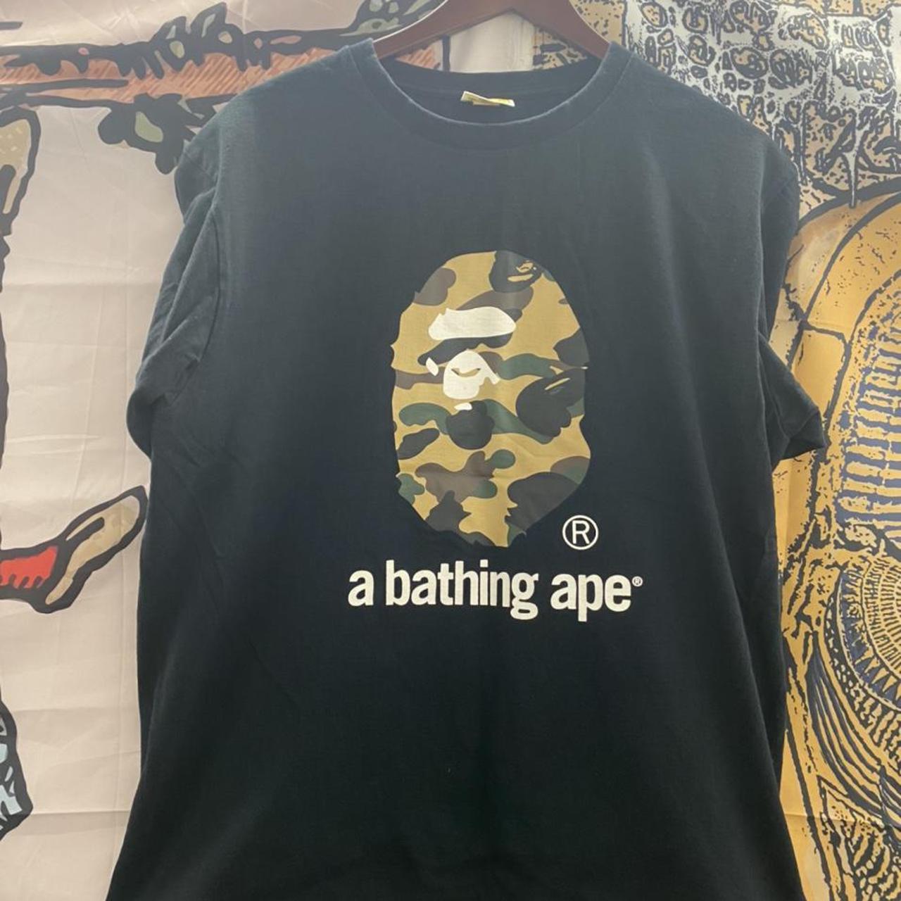 black and gold bape shirt