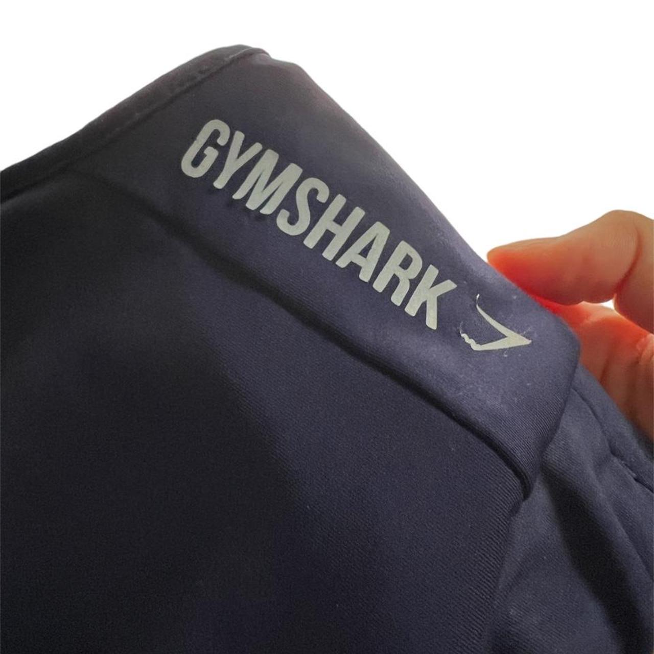 super cute gymshark navy and gold sports bra. loving... Depop