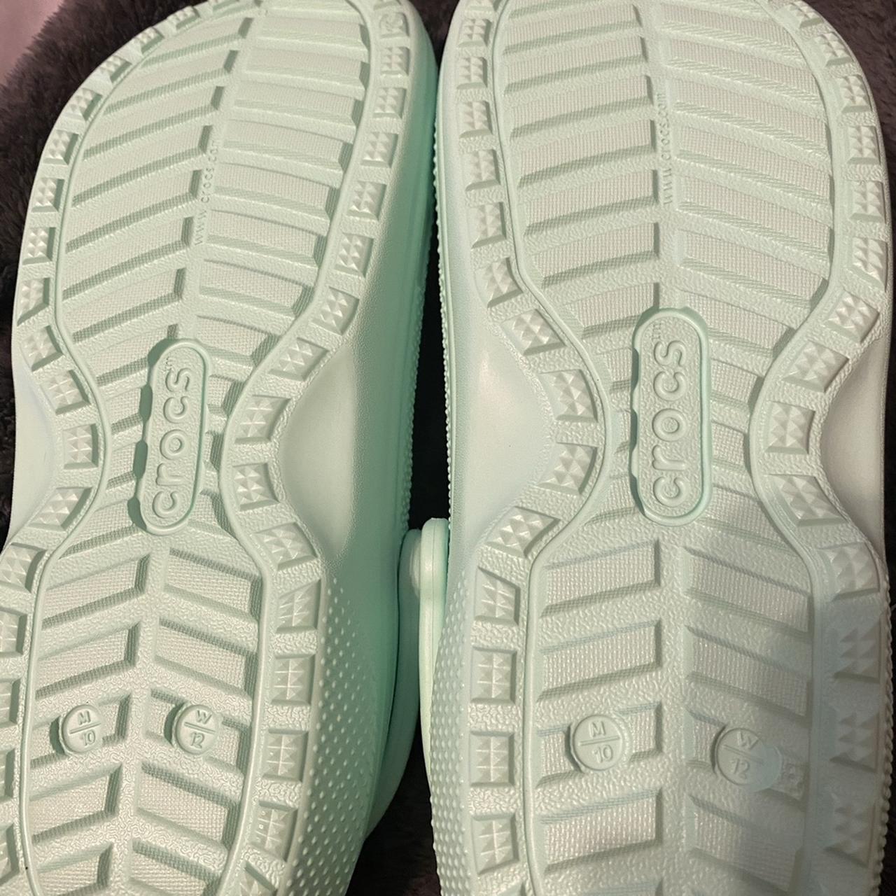 mint green fur lined crocs