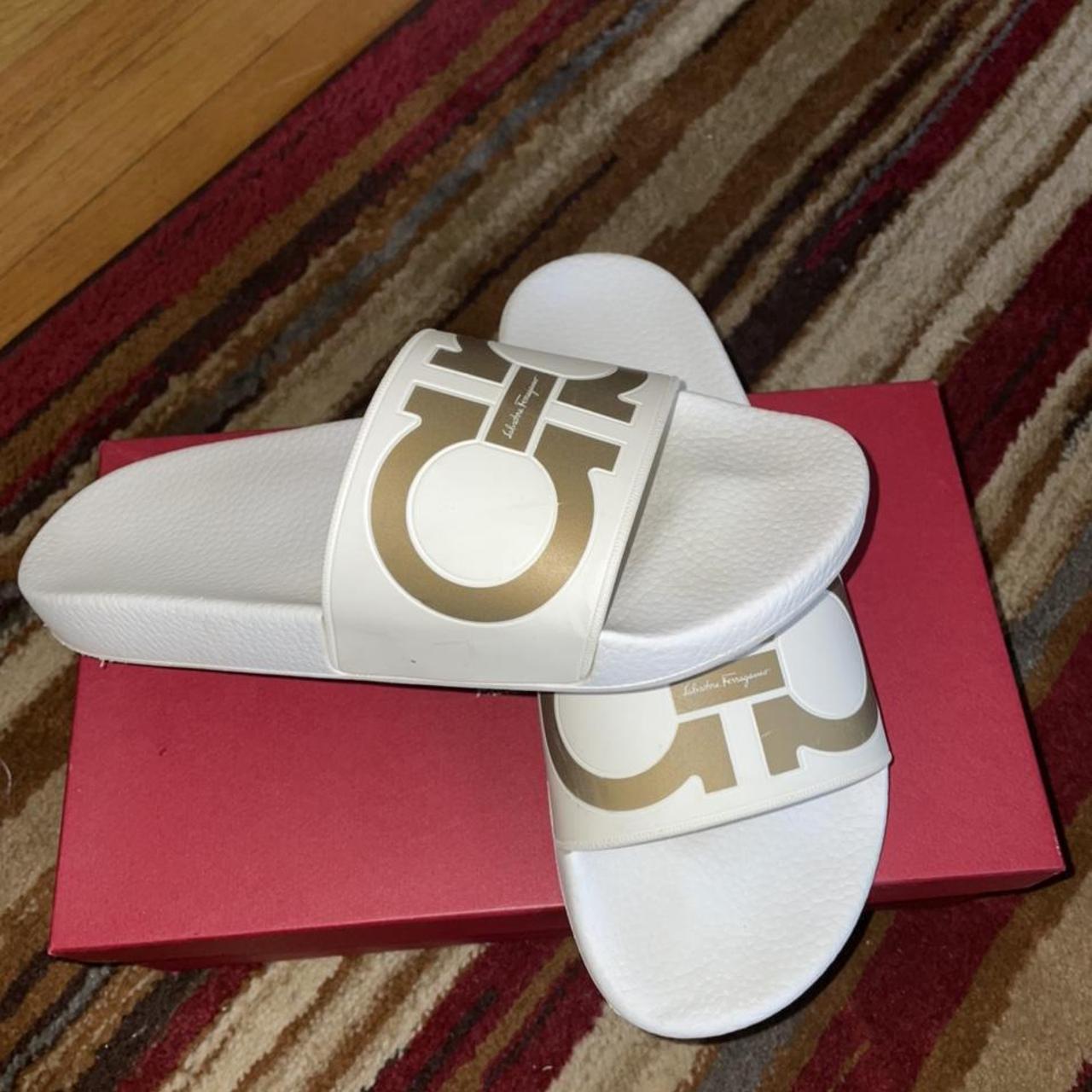 white and gold ferragamo slides