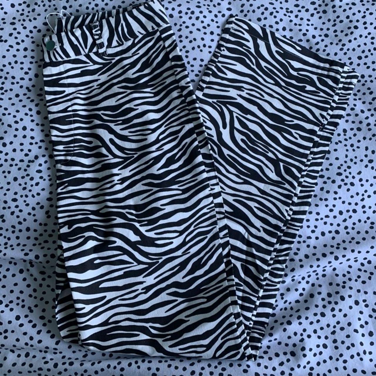 Zebra print trouser flairs! Perfect condition,... - Depop