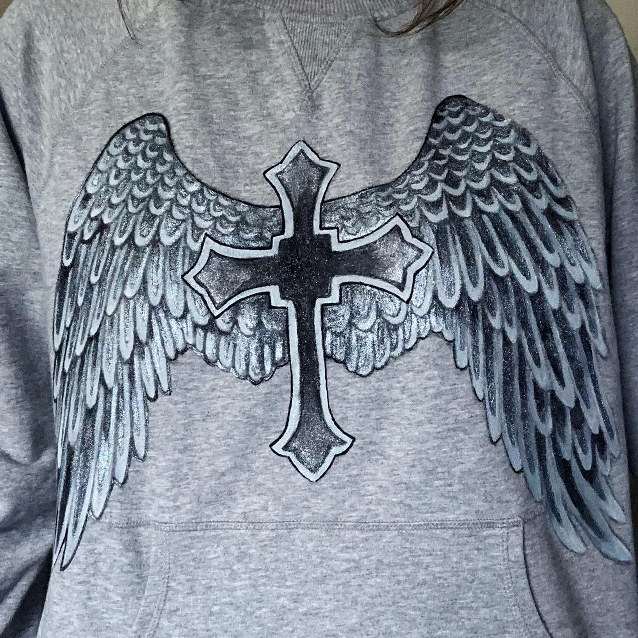 Y2K inspired cross angel wings painted pullover ... - Depop