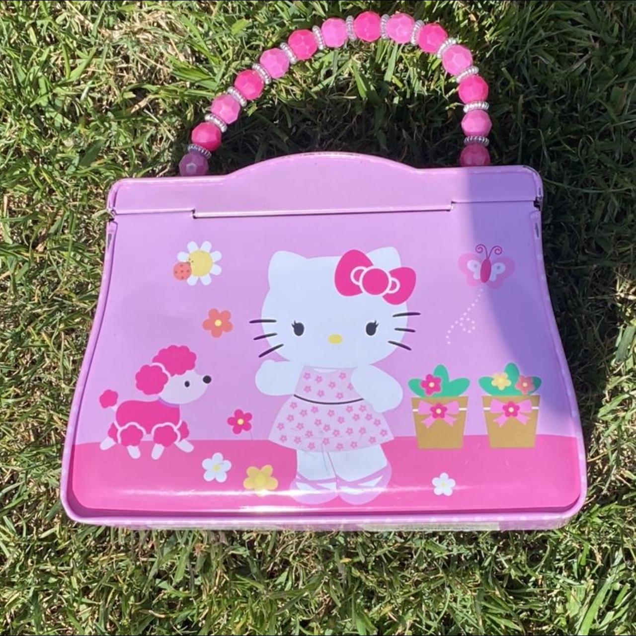 hello kitty tin purse