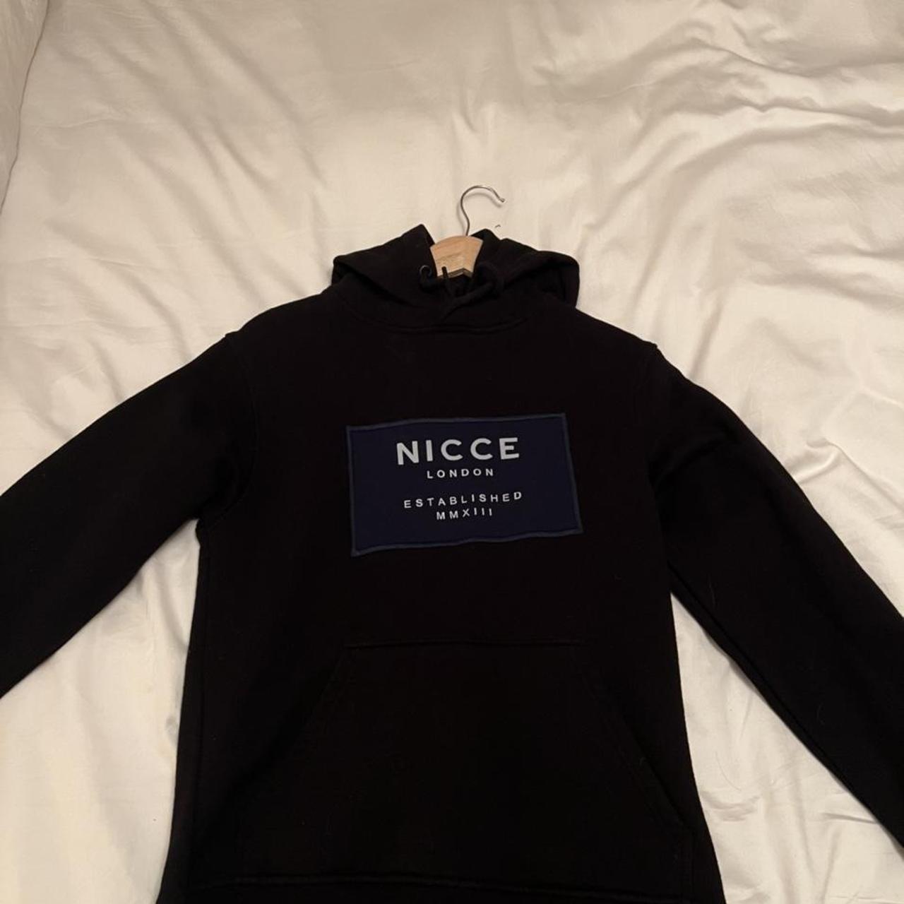 Nicce black and blue reflective hoodie Size S Good. Depop