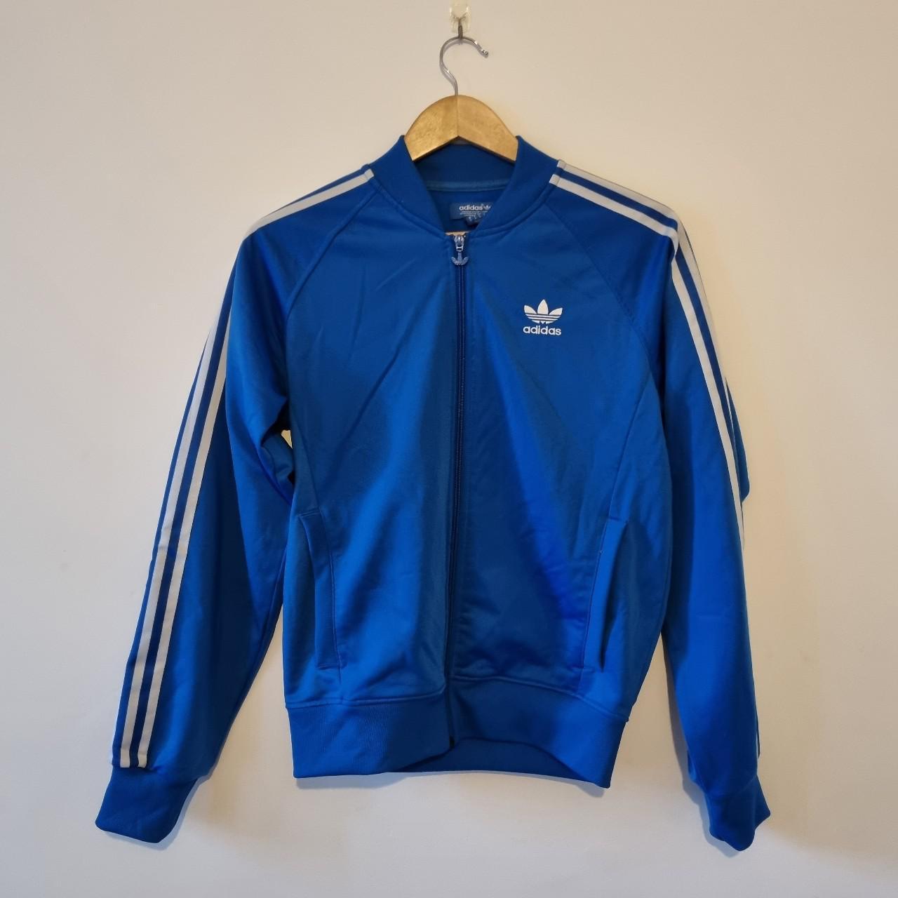 Bright blue Adidas track jacket, womens size... - Depop