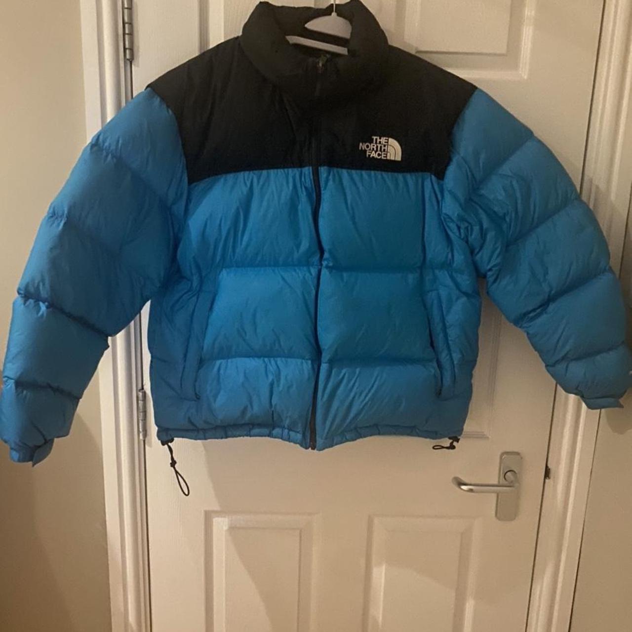 blue northface puffer jacket