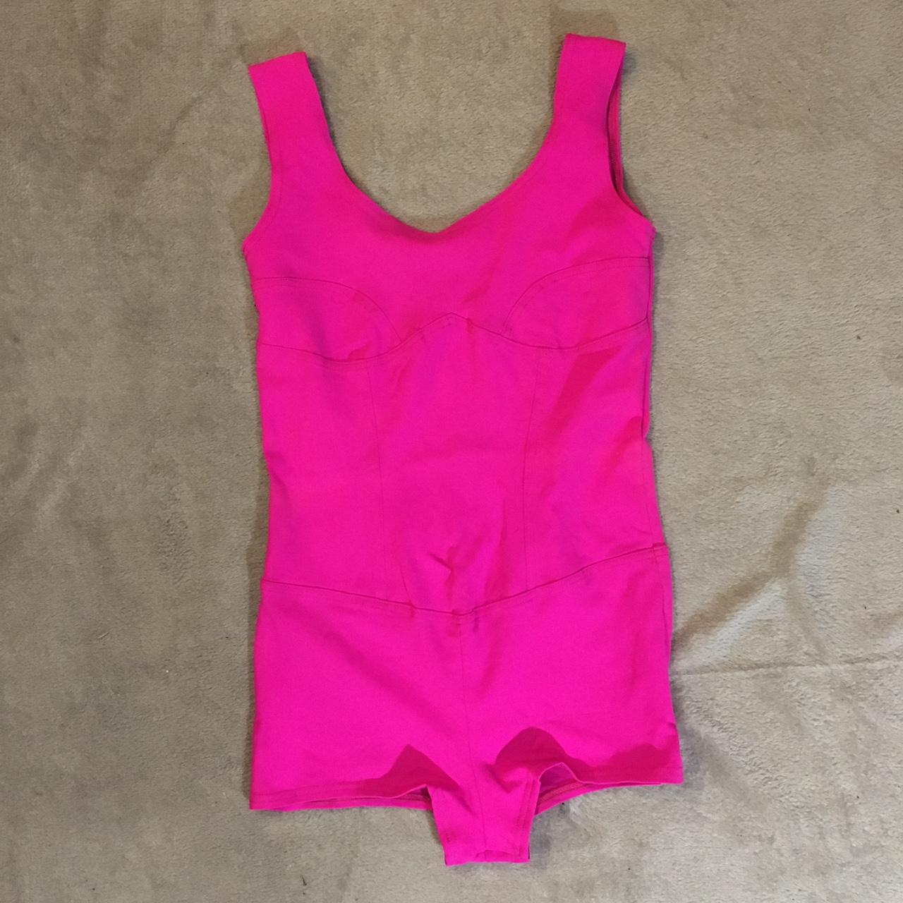 Cyberdog pink bodysuit. One size would fit up to a... - Depop