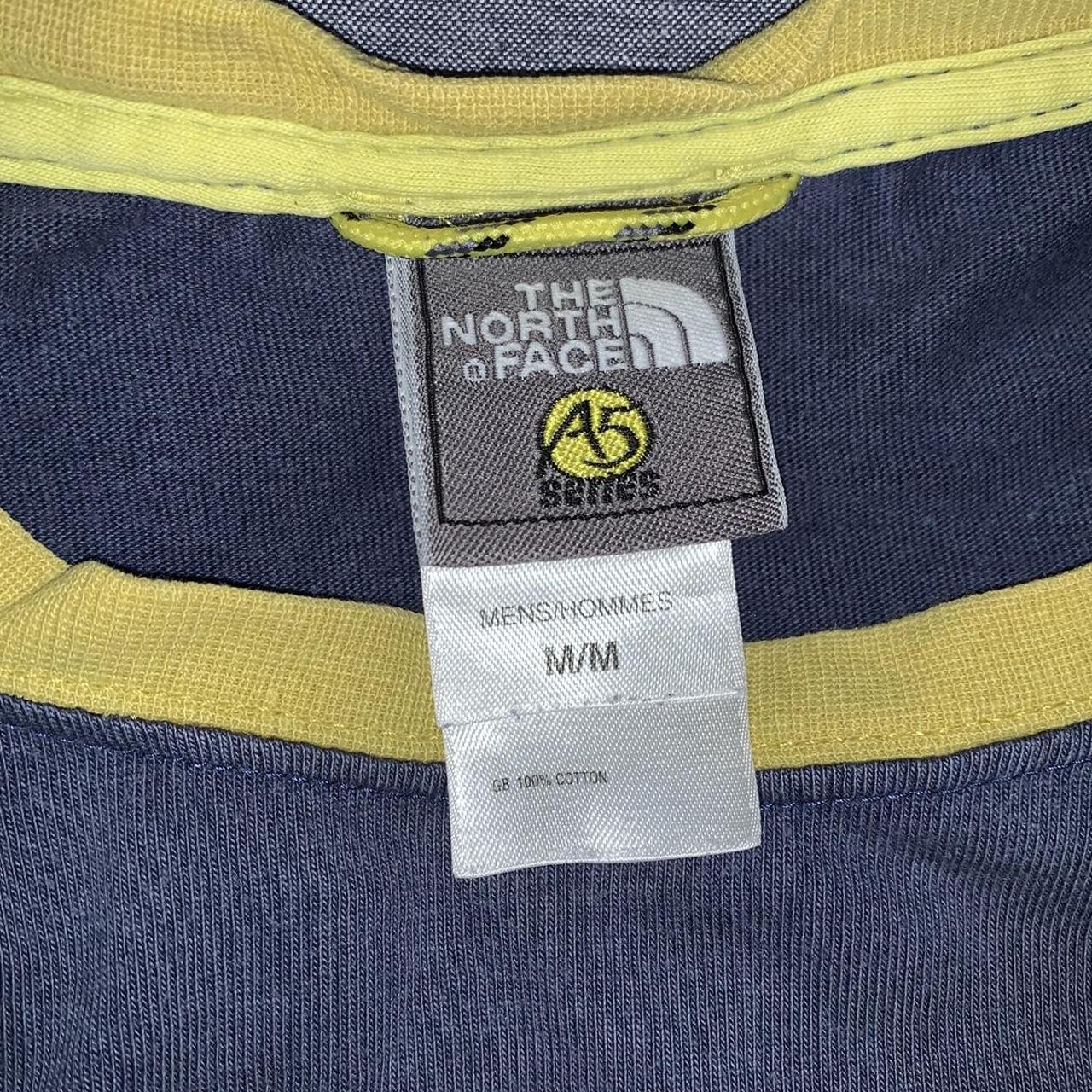 The North Face Men's Blue and Yellow T-shirt | Depop