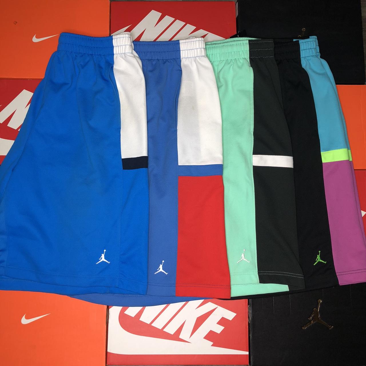 red and blue nike shorts