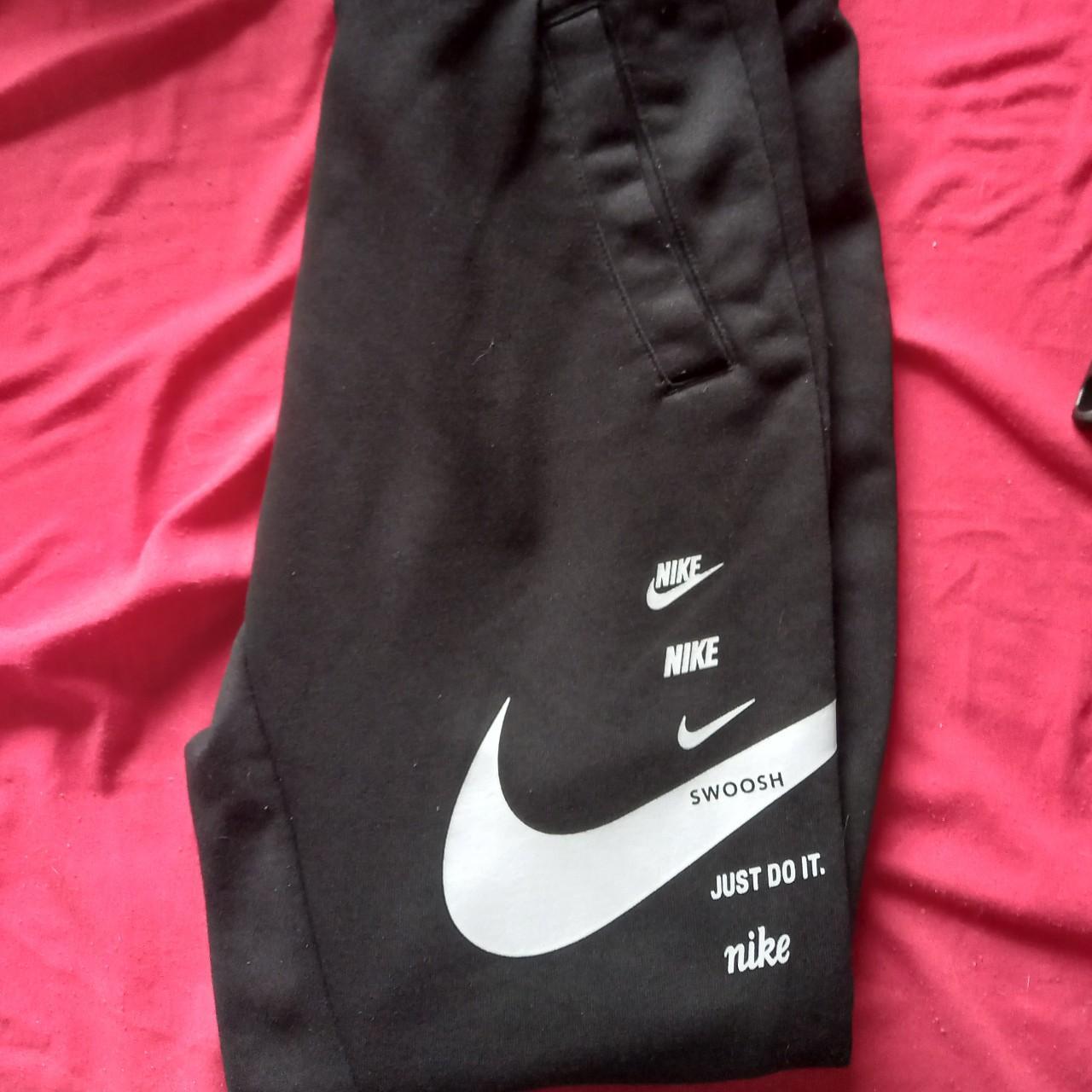 nike swoosh tracksuit bottoms