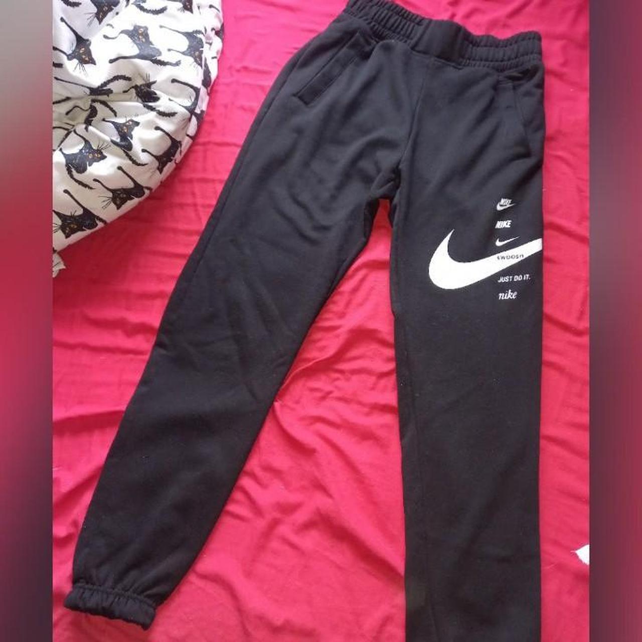 nike swoosh tracksuit bottoms