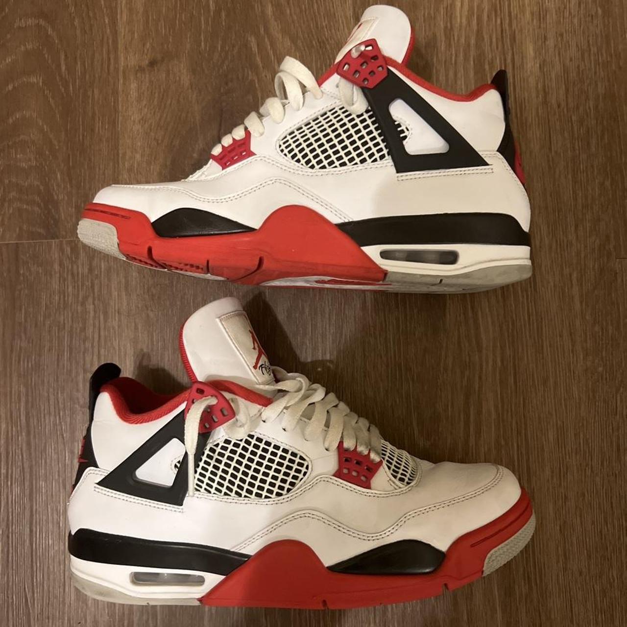 aged jordan 4 fire red