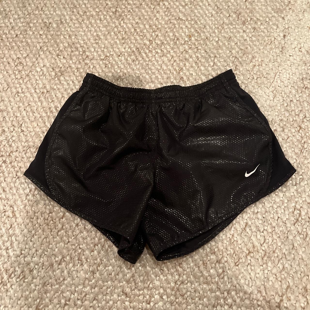 Black Nike shorts size medium slightly holographic... - Depop