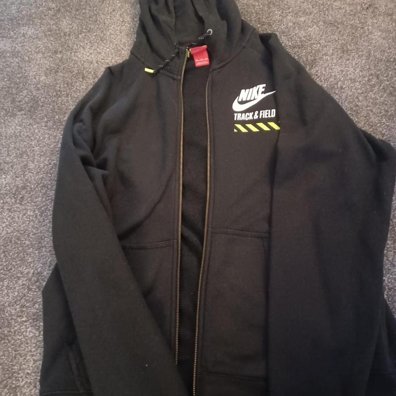 Mus carta proporcionar Nike Black Hoodie Track and field print on the front... - Depop