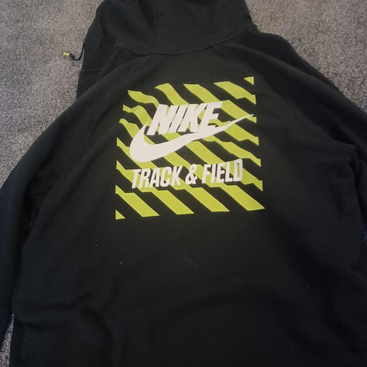 Mus carta proporcionar Nike Black Hoodie Track and field print on the front... - Depop
