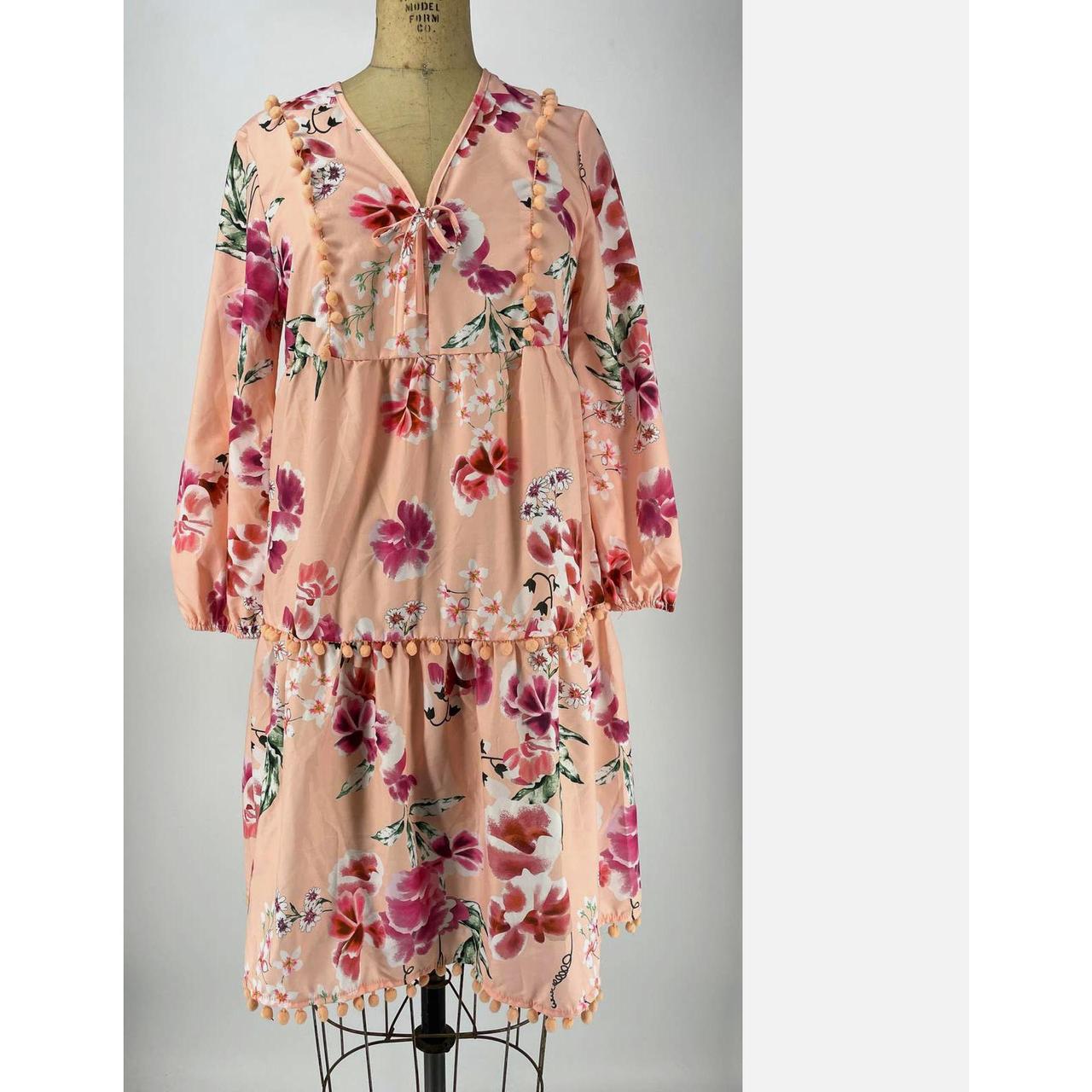 Here is a lightweight peach floral dress. V neck.... - Depop