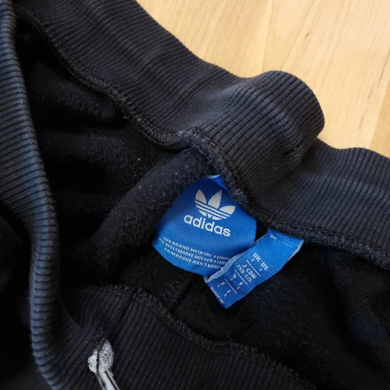 Adidas Originals tracksuit bottoms. Size large, logo... - Depop
