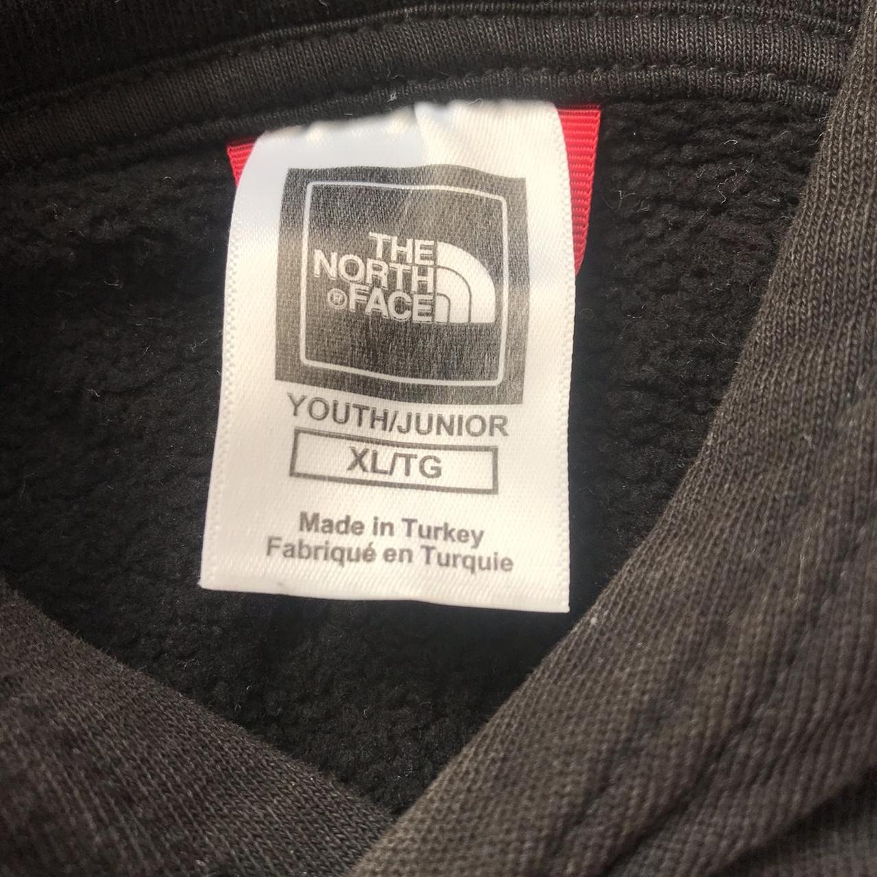 Black north face hoodie Kids xl but fits mens S - Depop