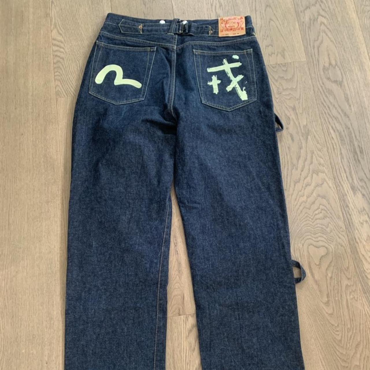 Vintage Evisu jeans, very rare type with straps down... - Depop