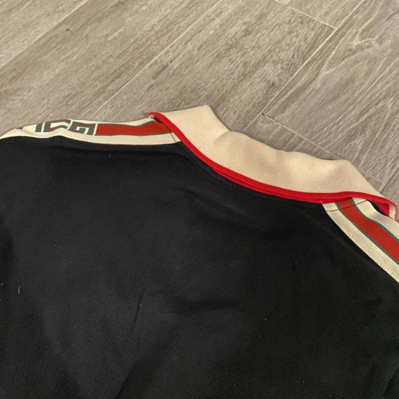 Gucci black polo shirt with cream collar and gucci... Depop