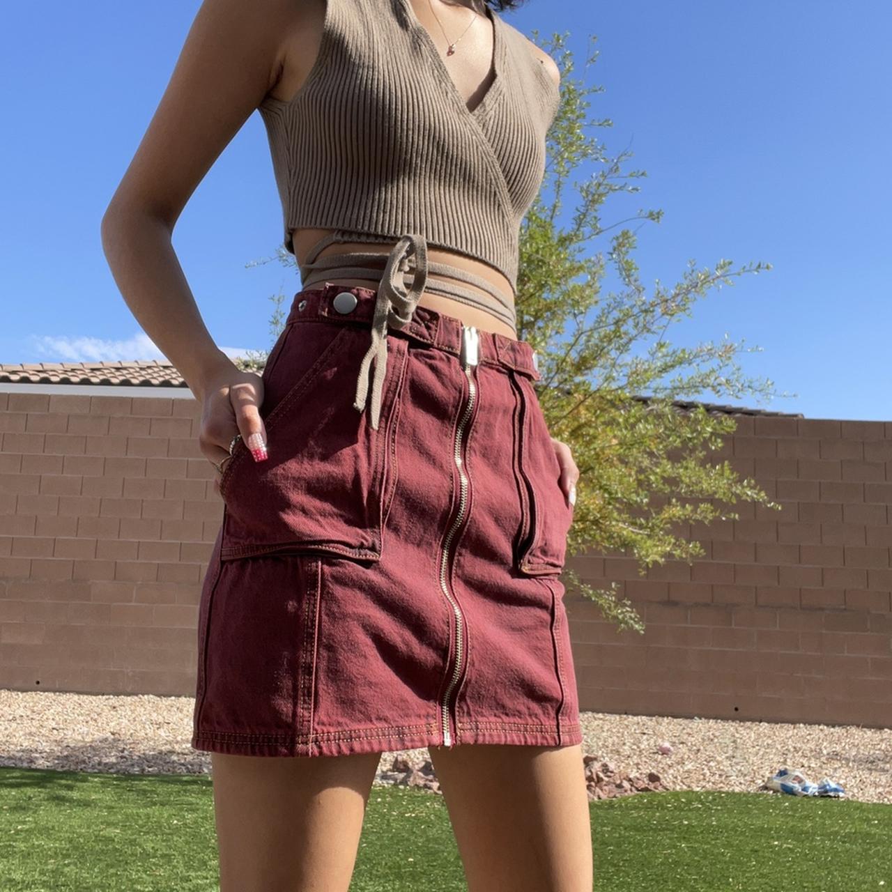 Burgundy cargo style skirt with full zip front. This... Depop