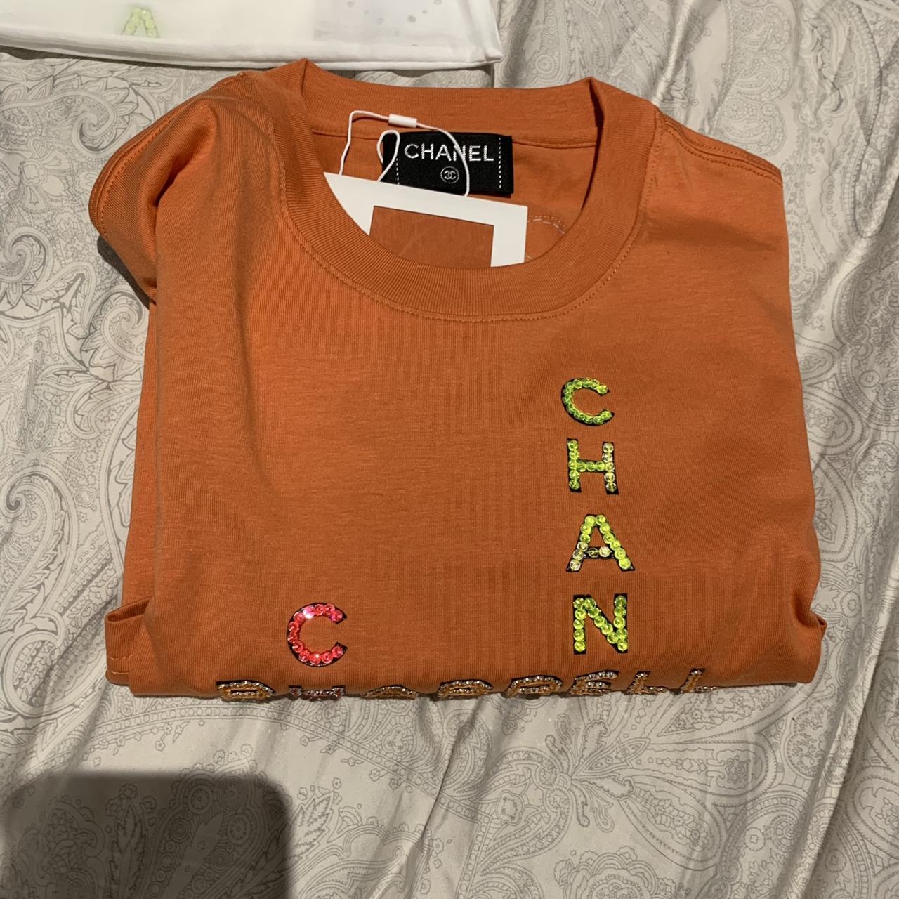 Chanel pharrell capsule collection Orange T-shirt - Depop