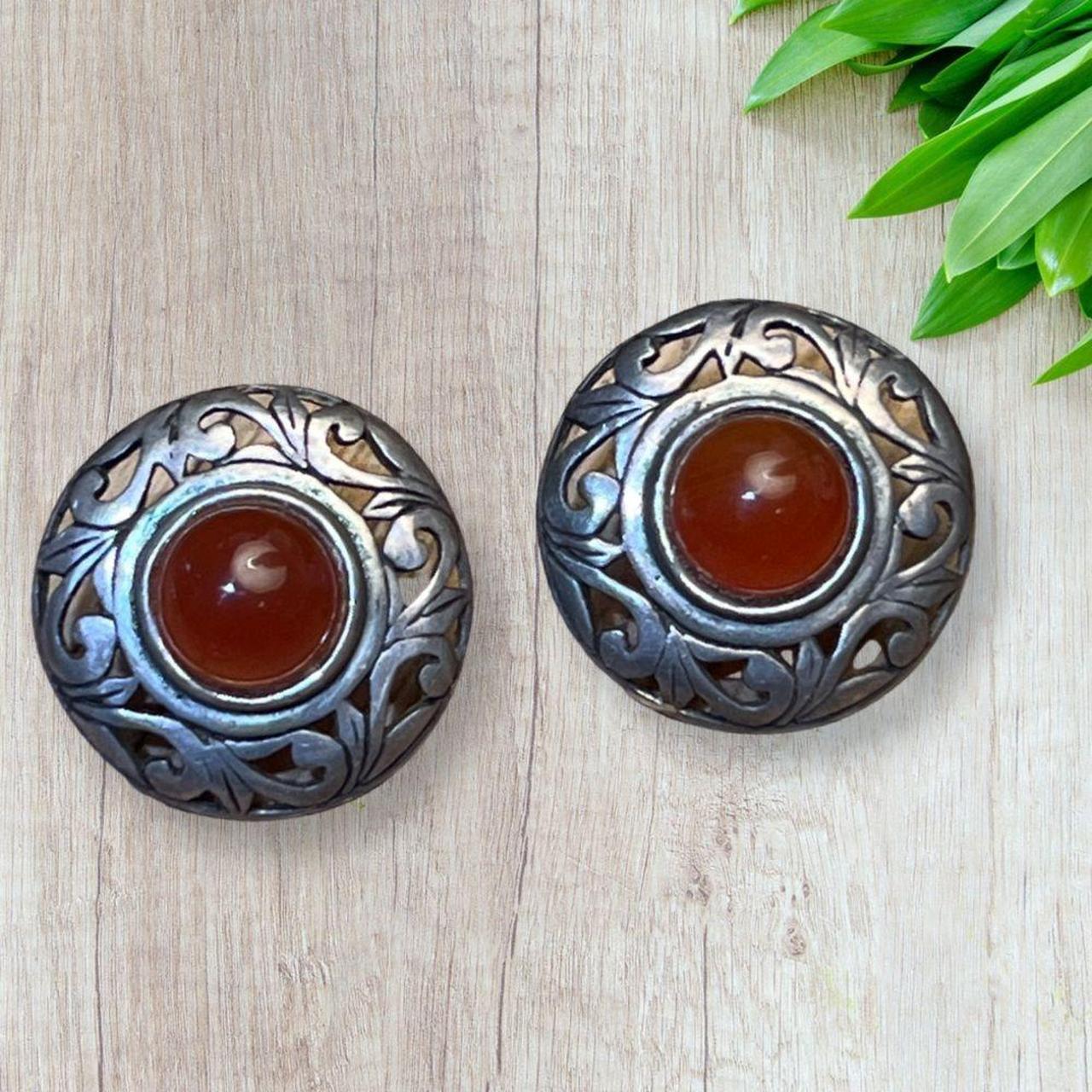 A very nice pair of handcrafted earrings made of Depop