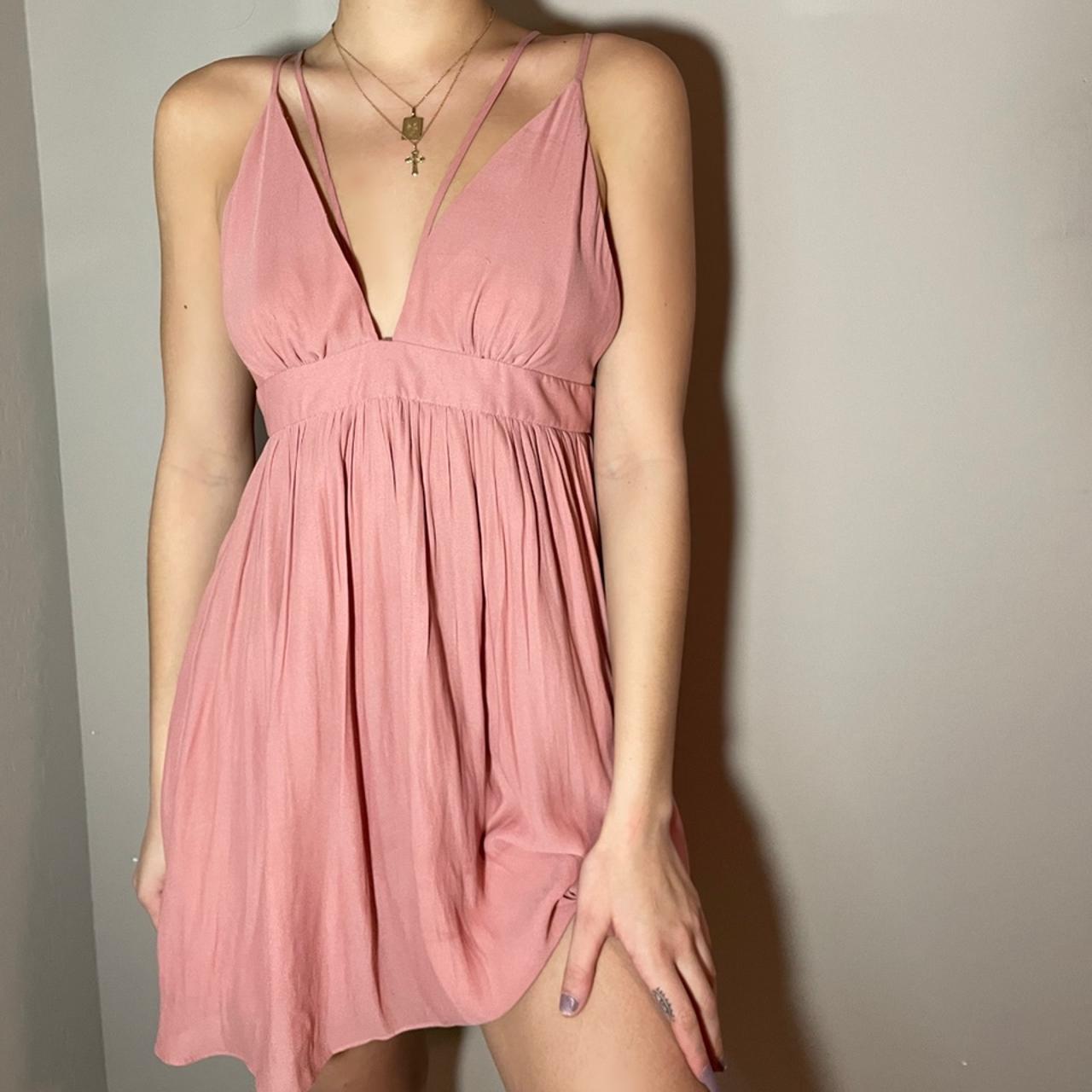 Cute baby pink flowy dress with pretty front and... Depop