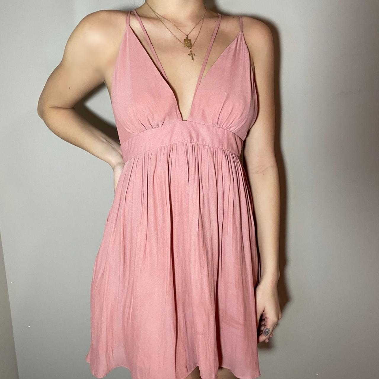 Cute baby pink flowy dress with pretty front and... Depop