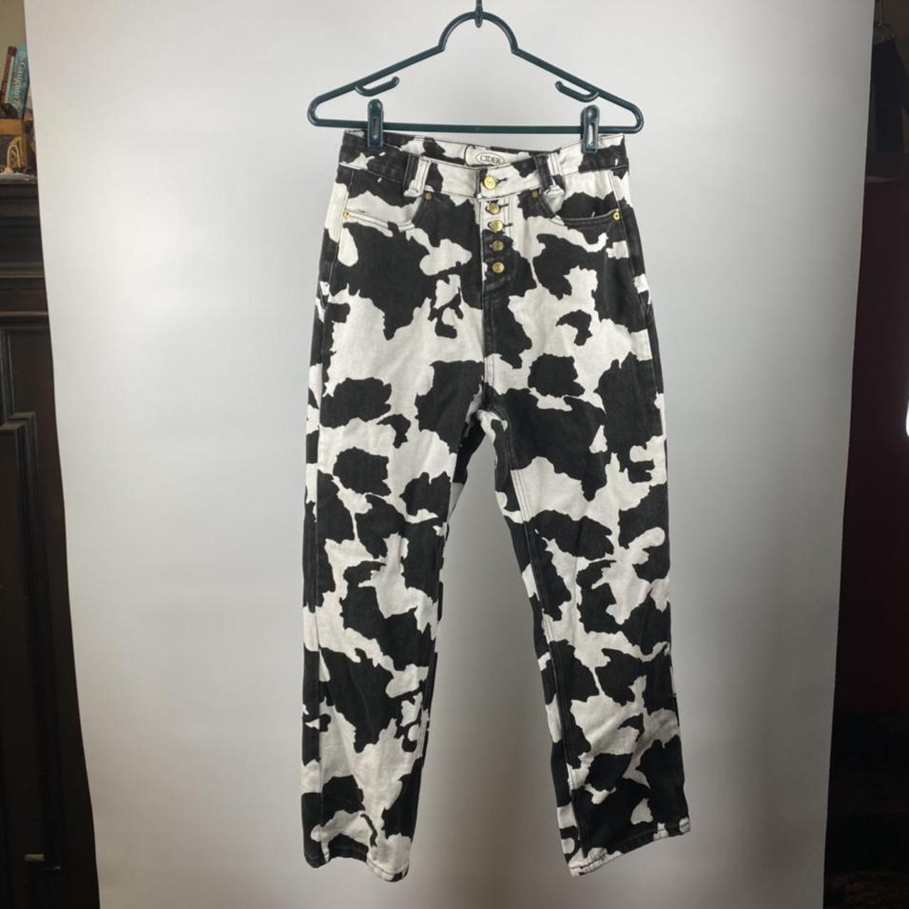 Cider cow print denim Sz L but fits like Sz
