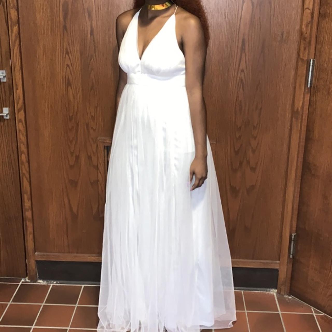 Cute, long maxi dress. Has two long slits in the... Depop