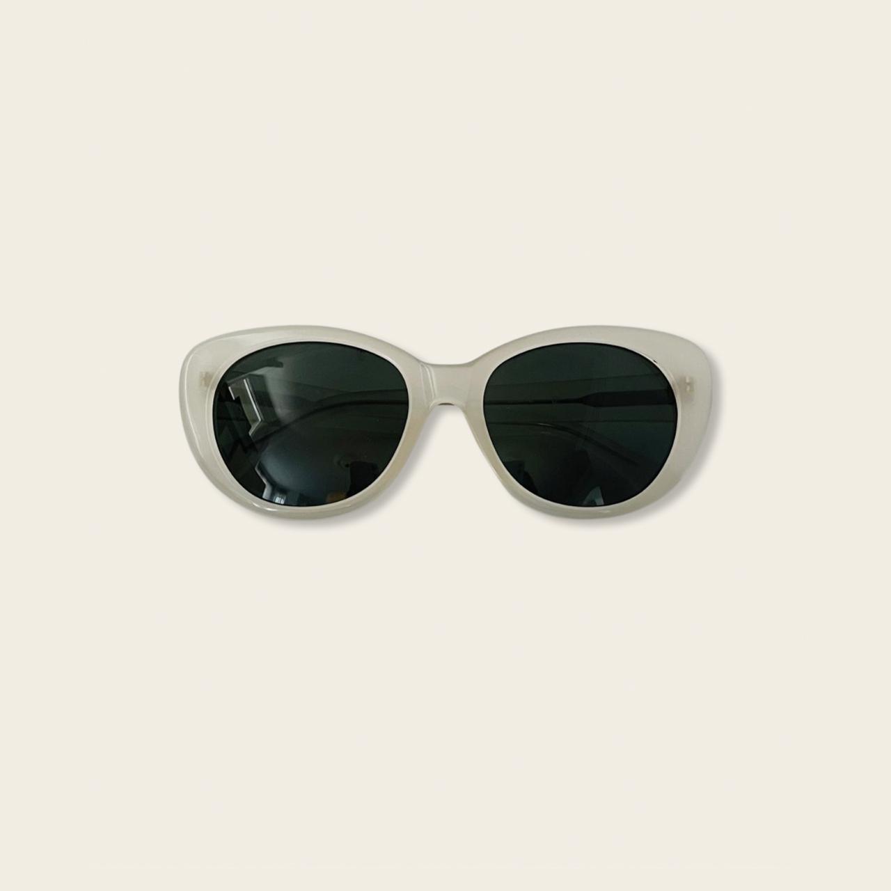 Light grey cateye sunglasses with black lens Depop