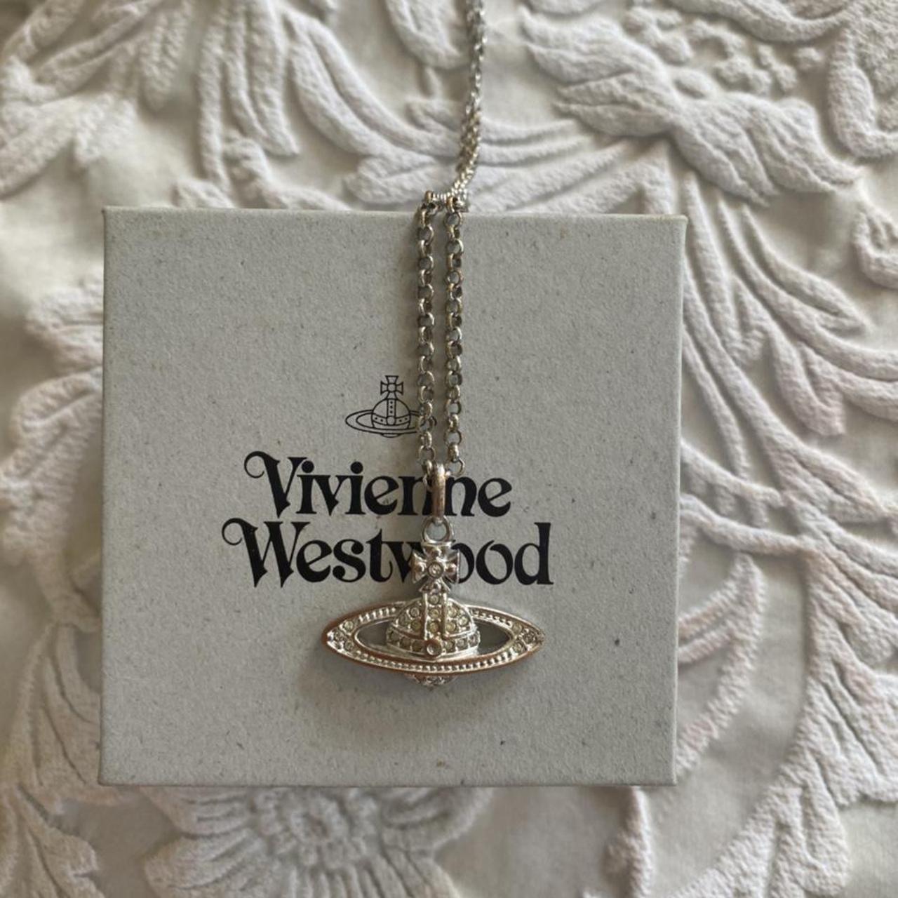 Selling my Vivienne Westwood necklace, slightly worn... - Depop